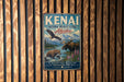 A vintage-style metal sign for the Kenai National Wildlife Refuge in Alaska, featuring an illustration of wildlife such as a moose, bear, and eagle.
