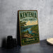 A vintage-style sign for the Kentucky State Forest, featuring a scenic landscape with a lake and mountains.
