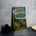 A vintage-style metal sign for Kettle Moraine State Forest in Wisconsin, featuring a scenic landscape with a path, trees, and a lake.