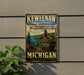 A vintage-style metal sign for Keweenaw National Historical Park, featuring a scenic landscape with a train and a river.