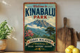 a vintage-style sign for Kinabalu Park, with a mountain landscape and text indicating it is a world heritage site.