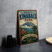 A vintage-style metal sign welcoming visitors to Kinabalu Park, featuring a mountain landscape and text indicating the park's name and its status as a world heritage site.