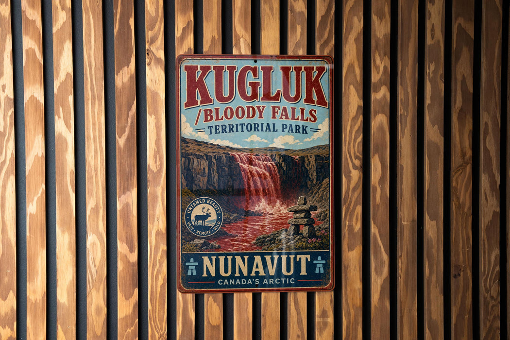 A vintage-style metal sign for Kugluk/Bloody Falls, located in Territorial Park, Nunavut, Canada.