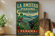 A vintage-style poster advertising the Panama Biosphere Reserve, featuring a colorful illustration of a bird and a black panther in a lush, tropical landscape.