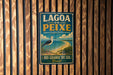 A vintage-style sign for the Lago do Peixe, a nature reserve in Brazil, featuring a bird and a beach scene.
