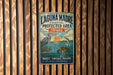 A vintage-style metal sign for the Laguna Madre Coastal Protected Area in Texas, featuring illustrations of birds, a heron, and a turtle in a natural setting.