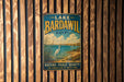 A vintage metal sign for Lake Bardawil in Egypt, featuring an illustration of a white heron standing on the shore of a lake surrounded by grass and trees.