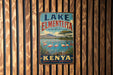 A vintage metal sign for Lake Elmenteeta, the bird watching paradise of Kenya, featuring a scenic landscape with flamingos and a mountain backdrop.