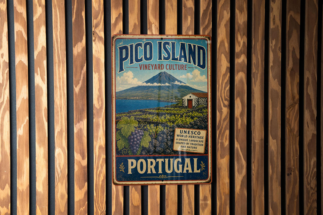 A vintage-style metal sign for Pico Island, Portugal, featuring a mountain landscape and vineyards.