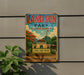 A vintage metal sign for Lang Son Park in Vietnam, featuring a colorful illustration of the park's architecture and landscape.