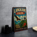 A vintage-style metal sign for Langkawi Park, Malaysia, featuring an eagle in flight and a suspension bridge in the background.