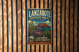A vintage-style metal sign for Lanzarote Biosphere Reserve in Spain, featuring a desert landscape with cacti and mountains.