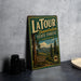 A vintage metal sign for Latour State Forest, California, featuring a scenic illustration of the forest and mountains.