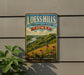 A vintage-style metal sign for Loess Hills, Iowa, featuring a scenic landscape with a river and flowers.