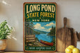 A vintage-style poster advertising Long Pond State Forest in New York, featuring a scenic image of a lake surrounded by pine trees and mountains.