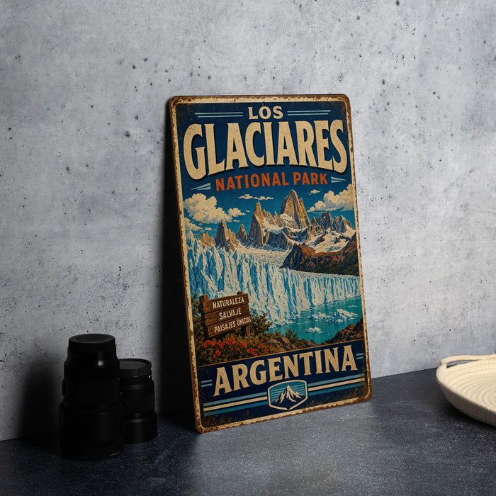 A vintage-style metal sign for the Los Glaciores National Park in Argentina, featuring a scenic mountain landscape.