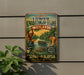a vintage-style metal sign advertising a wildlife reserve, specifically the Kinabatangan- Segama Wetlands, in Sabah, Malaysia.