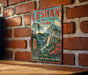 A vintage-style sign for Lushan National Park in China, featuring a scenic landscape with mountains, trees, and a temple.