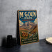A vintage metal sign for M'Goun Park in Morocco, featuring a mountain landscape and text promoting the park's nature, culture, and heritage.