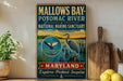 A vintage-style sign for the Mallow's Bay-Potomac River National Marine Sanctuary in Maryland, featuring an illustration of a heron and a river scene.