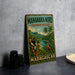 A vintage-style metal sign for the Mananara-Nord Biosphere Reserve in Madagascar, featuring a lush tropical landscape with a lemur and a kingfisher bird.