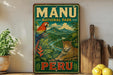 A vintage-style sign for the Manu National Park in Peru, featuring a parrot and a jaguar in a lush, tropical landscape.
