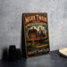 A vintage-style metal sign for the Mark Twain House in Hartford, Connecticut, featuring an illustration of the house and the text "The Home of America's Greatest Storyteller" and "Mark Twain".