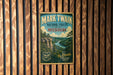 A vintage-style metal sign for the National Forest in Missouri, featuring a scenic landscape with a river and mountains.