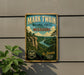 A vintage-style metal sign for the National Forest in Missouri, featuring a scenic landscape with a river and mountains.