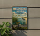 A vintage-style metal sign for Masonboro Island Estuarine Reserve in North Carolina, featuring a seagull and a turtle in a grassy area with a body of water.