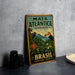 A vintage metal sign for the Matata Atlantica Biosphere Reserve in Brazil, featuring a toucan and lush tropical foliage.