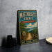 A vintage metal sign for the Mattabesett Trail in Connecticut, featuring a scenic illustration of a path leading through a forested landscape.