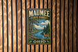 A vintage metal sign for the Mauhee State Forest in Ohio, featuring a scenic landscape with a deer and pine trees.