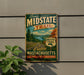 A vintage metal sign for the scenic midstate trail, featuring a scenic landscape with a road, trees, and mountains.