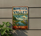 A vintage-style metal sign for the Minnesota Valley National Wildlife Refuge, featuring an illustration of a bird and a river surrounded by lush vegetation.