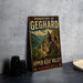 A vintage-style metal sign with the text "MONASTERY OF GEGHARD AND THE UPPER AZAT VALLEY ARMENIA" and an illustration of a castle or cathedral in the background.