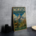 A vintage-style metal sign with a mountain landscape and a goat, advertising the Monviso Biosphere Reserve in Italy.