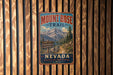 A vintage metal sign for the Mount Rose Trail in Nevada, featuring a scenic mountain landscape and inviting visitors to explore the High Country.