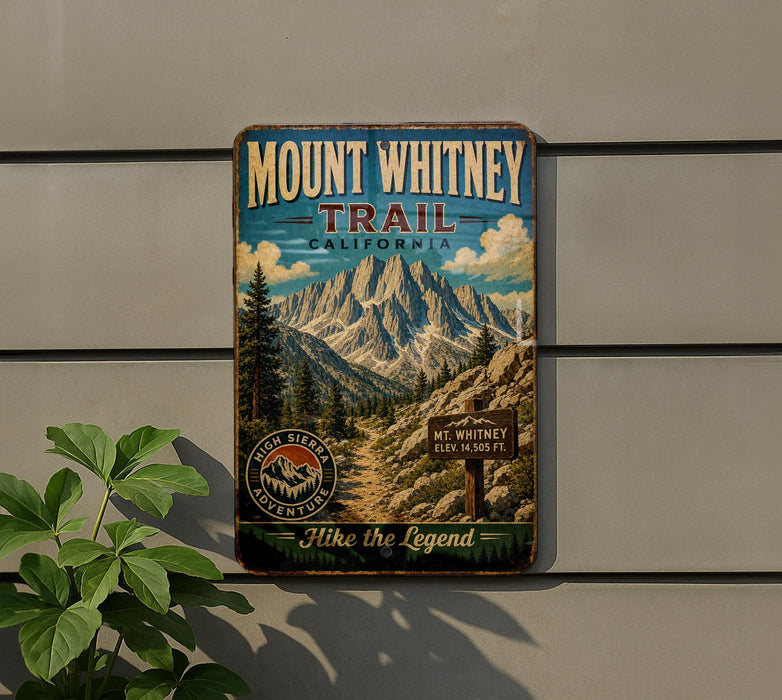 Mount Whitney Trail sign on a wall, featuring a scenic mountain landscape with a trail and a sign indicating the trail's name and distance.