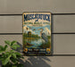 A vintage-style metal sign for the Muscatuck National Wildlife Refuge in Indiana, featuring an illustration of a bird and a marshy landscape.