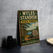A vintage-style metal sign for Myles Standish State Forest in Plymouth County, Massachusetts, featuring a scenic illustration of a forest and a lake.