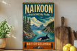 a vintage-style sign for the Naikoon Provincial Park in British Columbia, Canada, with a scenic landscape of mountains, trees, and a whale in the water.