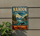 A vintage-style sign for Naikoon Provincial Park in British Columbia, featuring a scenic landscape with mountains, a whale, and a river.