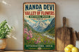 A vintage-style sign for the Nanda Devi Valley of Flowers in Uttarakhand, India, featuring a mountainous landscape with colorful flowers.