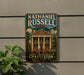 A vintage-style metal sign for Nathaniel Russell House in Charleston, South Carolina, featuring an illustration of the historic building.