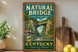 A vintage-style sign for Natural Bridge State Resort Park in Kentucky, featuring a scenic illustration of the rock arch and a wooden bridge.