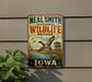 A vintage-style metal sign for the Neal Smith National Wildlife Refuge in Iowa, featuring a duck in flight and a birdhouse in the background.
