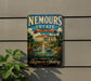 A vintage metal sign for Nemours Estate in Delaware, featuring an illustration of a grand mansion with a fountain in the foreground.
