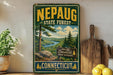 A vintage-style sign for the Nepauug State Forest in Connecticut, featuring a scenic landscape with pine trees, a river, and mountains.
