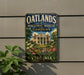 A vintage-style metal sign for the Oatlands Historic House and Gardens in Virginia, featuring a large illustration of a historic house surrounded by a well-manicured garden.
